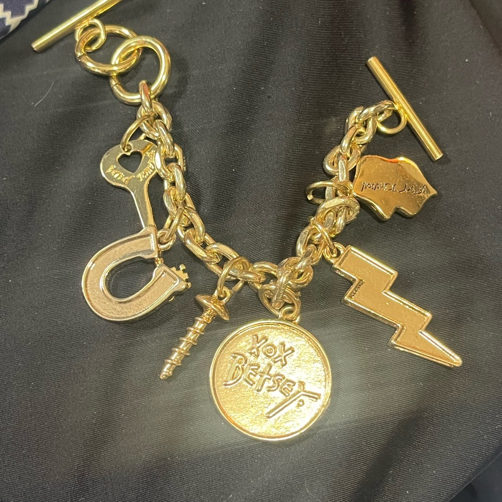 Gold Charm Bracelet with Iconic Symbols